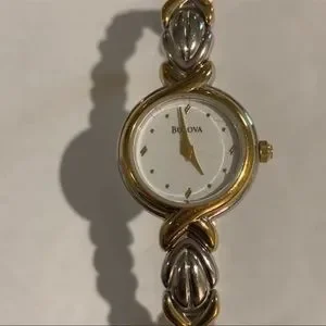 Bulova watch 
Delicate white faced watch with woven bracelet 
6 3/4 
1/4 width Bulova Phantom Watch – Michaels Jewelers main image 4